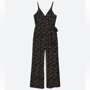 Rochelle knit jumpsuit. Size medium.